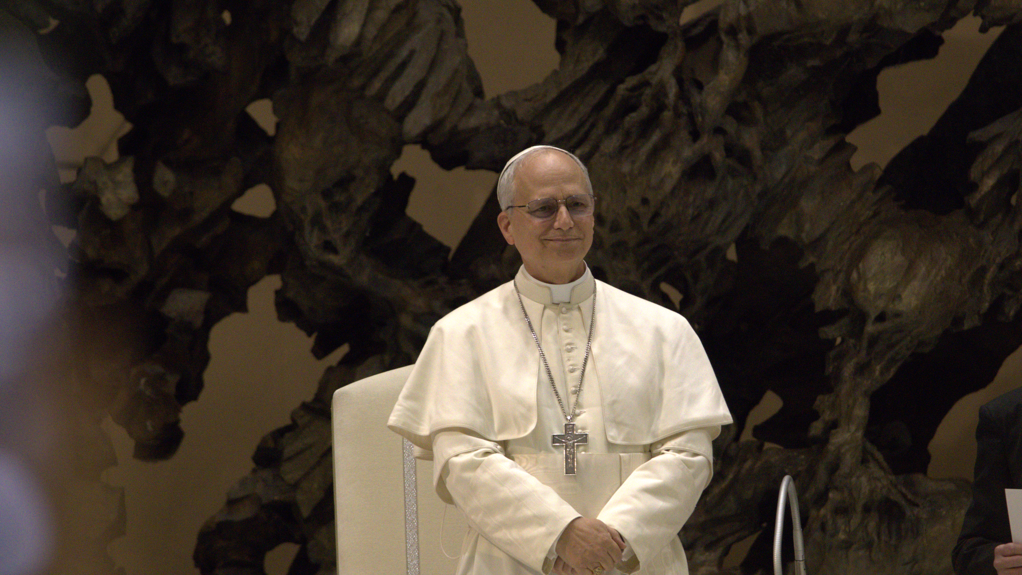 Pope Leo in his white garments smiling