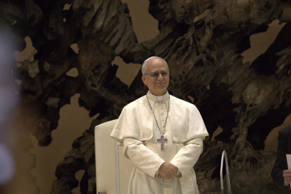 Pope Leo in his white garments smiling