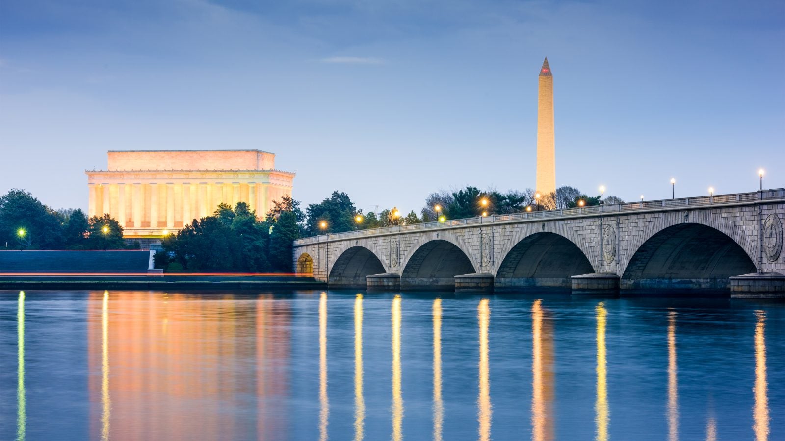 Monuments over a river with a bridge