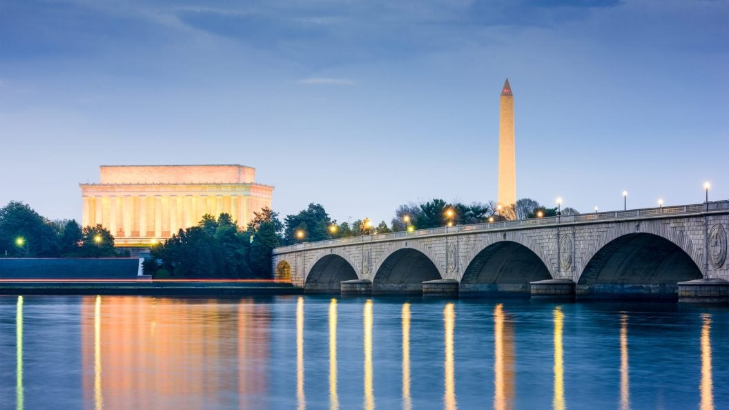 Monuments over a river with a bridge