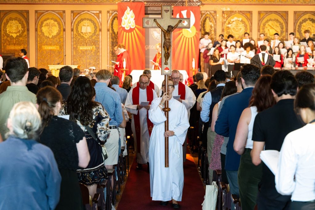 A Catholic Mass processing in Gaston Hall