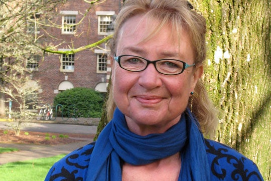 Helen Neville smiles in a headshot.