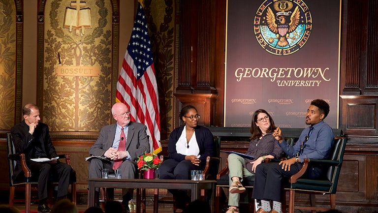 Rev. Matthew Carnes, S.J., Shaun Casey, Marcia Chatelain, Rabbi Rachel Gartner and Terrence Johnson on stage in Gaston Hall