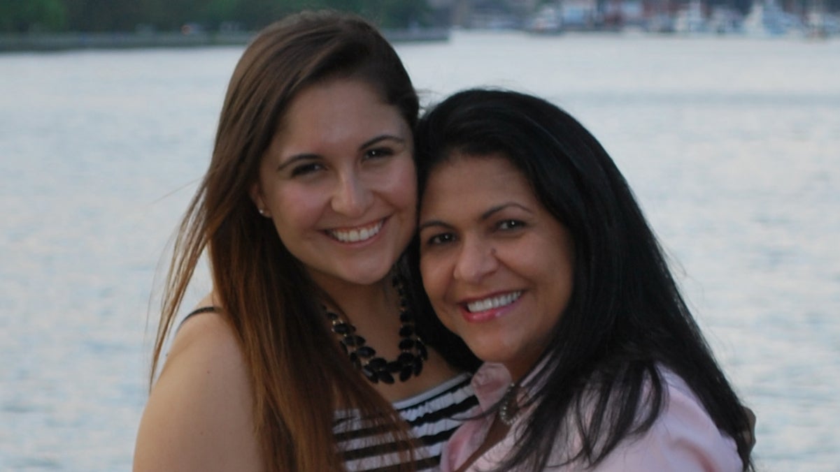 Monica and Olga O'Hearn smiling with the Potomac river behind them.