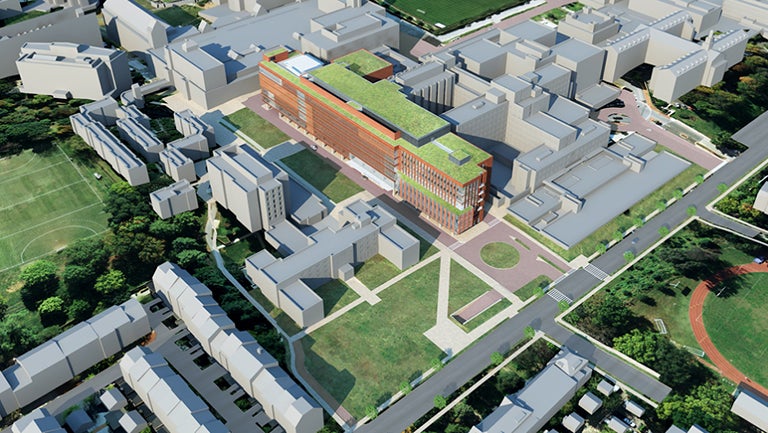 The medical/surgical pavilion surrounded by existing buildings on campus