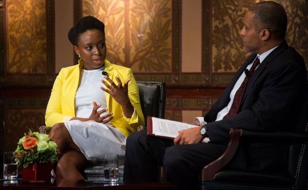 Chimamanda Ngozi Adichie and Scott Taylor talk on stage in Gaston Hall