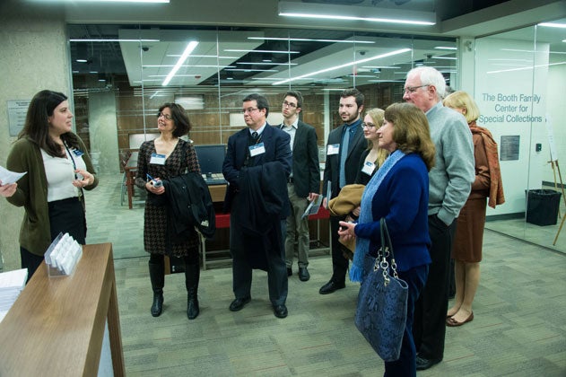 A group tours the new Booth Family Center for Special Collections.