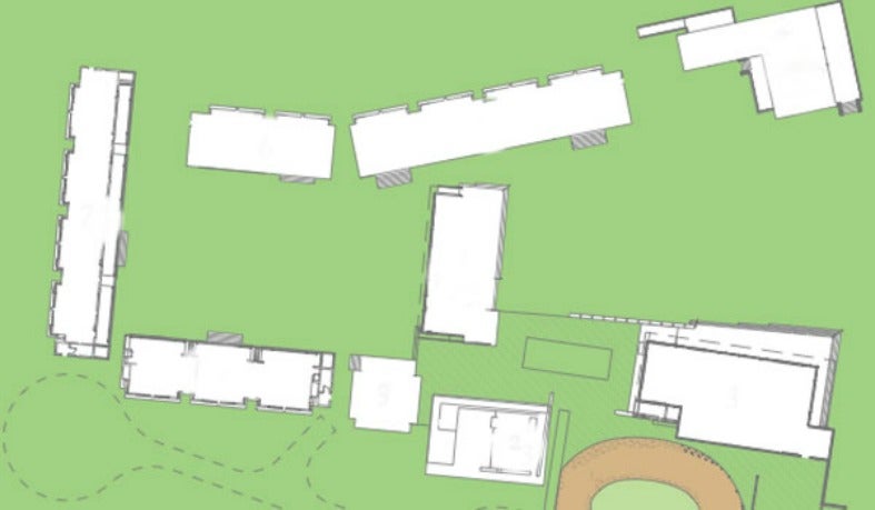 A digital building layout includes a dining hall, chapel and cabins.