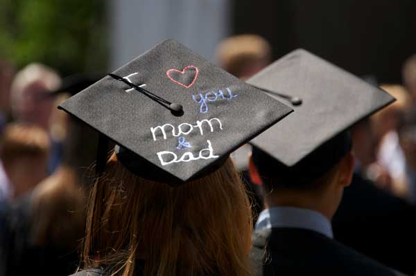 A graduation cap reads "I love you mom and dad"