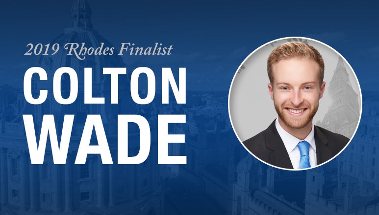 Blue graphic featuring Colton Wade, 2019 Rhodes Scholarship Finalist