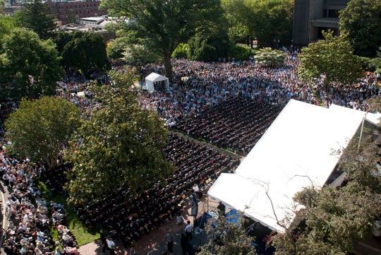 View of seated graduates from top of Healy Hall