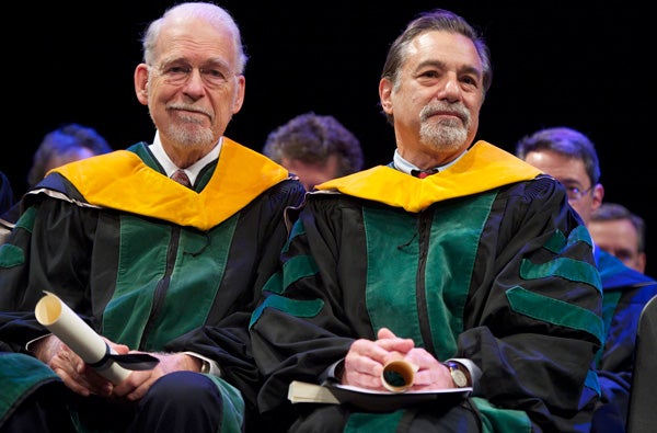 Ross Fletcher and Michael Zasloff seated on stage