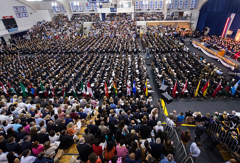 The graduating senior class and their famiiles during Senior Convocation in McDonough Arena