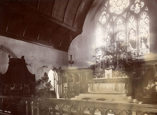 A photo of the original interior. Stained-glass from Munich, Germany, sits above the high altar in 1893. 
