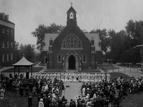 Members of the Georgetown community gather in an open Dahlgren Quadrangle in this photograph from 1922.
