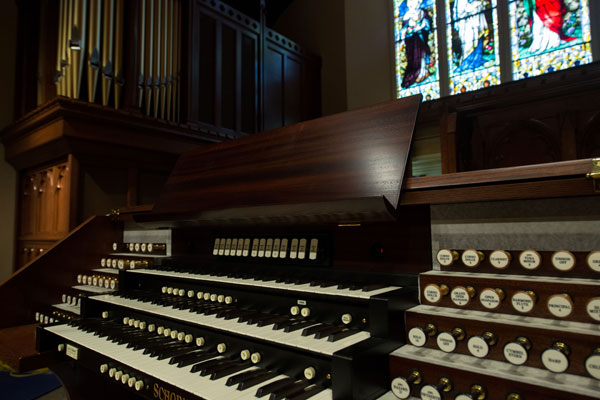 A photo of the Lewnowski family's donated organ, which was constructed and installed behind the chapel’s altar.
