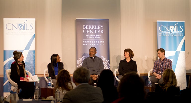 Marjorie Mandelstam Balzer, Deirdre Jonese Austin, Rev. Ludovic Lado, S.J., Cheryl Suzack and Andrew Walker talk during a panel.