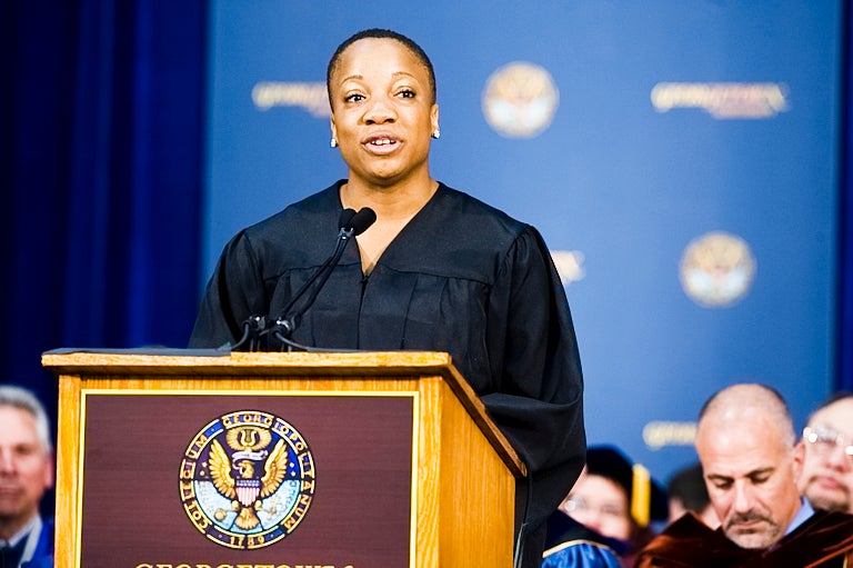 Pamela Nwaoko on stage giving a speech during Georgetown's 2010 Convocation.