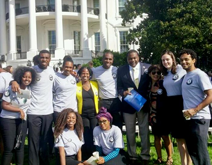 Nekeisha Neal Jones poses in front of the White House with Public Allies