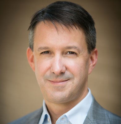 Jeffrey J. Selingo, dressed in a jacket and button-down, smiles in a headshot.