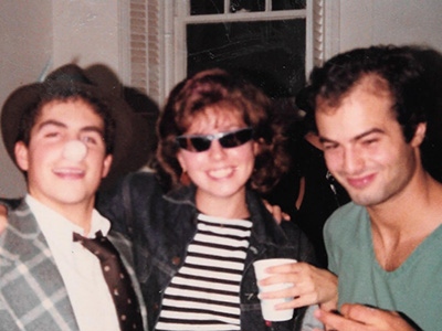 Mary Esselman as Georgetown student wearing sunglasses with two other students, one wearing rubber nose