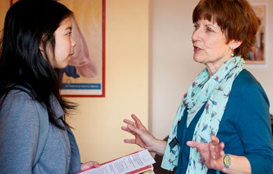 Maureen Corrigan talking to a student