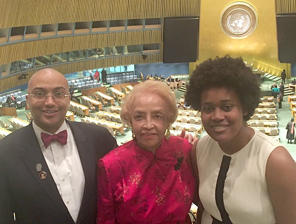 GU 272 descendants Jeremy Alexander, Onita Estes-Hicks and Jada Hawkins in front of the U.N. General Assembly