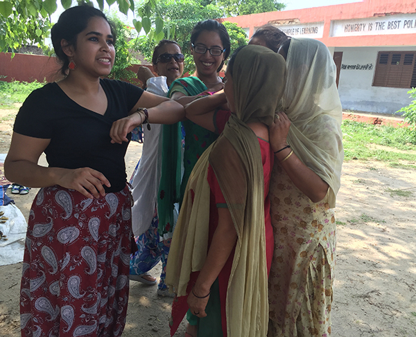 Devika Ranjan works with young refugee women during a global workshop