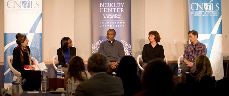 Marjorie Mandelstam Balzer, Deirdre Jonese Austin, Rev. Ludovic Lado, S.J., Cheryl Suzack and Andrew Walker talk during a panel.