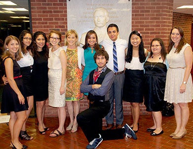 Jane Genster, fifth from left, poses with Georgetown student mentors of Cristo Rey and KIPP students participating in the 2013 Summer Immersion program.