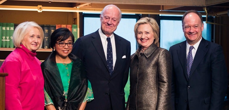 Hillary Rodham Clinton, Georgetown President John J. DeGioia, Melanne Verveer, Staffan de Mistura and Miriam Coronel-Ferrer smile for the camera at the 2015 Hillary Rodham Clinton Awards for Advancing Women in Peace and Security at Georgetown.