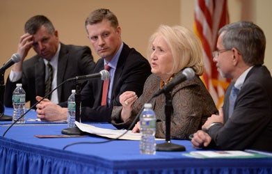 Melanne Verveer speaks as two other panelists look on.