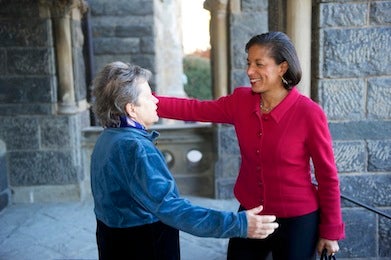 SFS Dean Carol Lancaster greets U.S. National Security Advisor Susan Rice near Healy Hall.