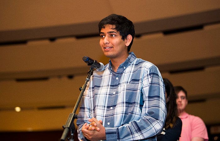 Vikram Venkatram stands at the front of a line to ask Madeleine Albright a question