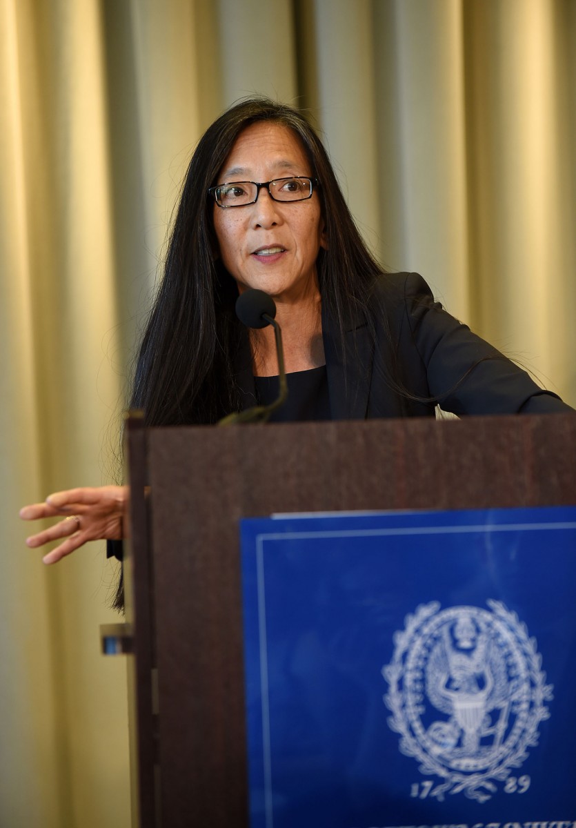 Judge Pamela Chen speaks at the lectern with Georgetown University signage on it.