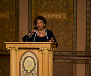 Loretta Lynch speaking at podium