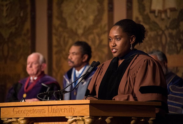 Professor Marcia Chatelain delivers the invocation during the honorary degree ceremony 