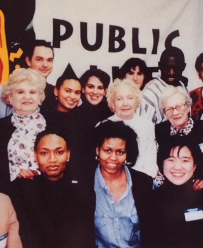 First Lady Michelle Obama is shown in an old photo with members of Public Allies Chicago