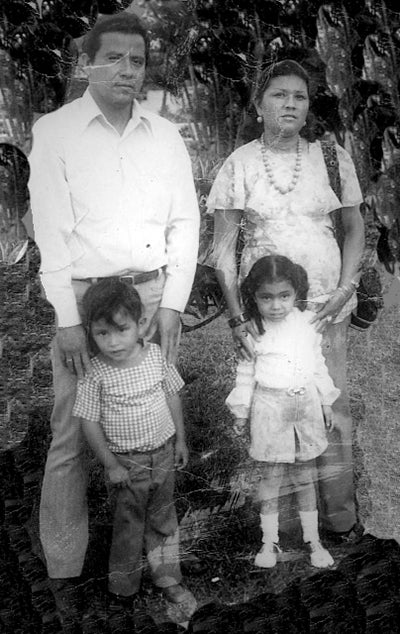 Abel Núñez is shown here as a child with his father, Abel Antonio Núñez, his mother, Edith, and sister, Ana.