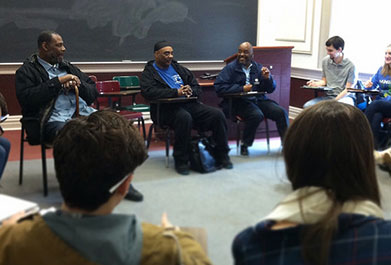 Former inmates Elvin Johnson, Ricky Bryant and William Lawson meet with students from Patricia O’Connor’s Prison Literature class.
