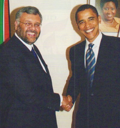 Ebrahim Rasool shakes hand with then Senator Barack Obama