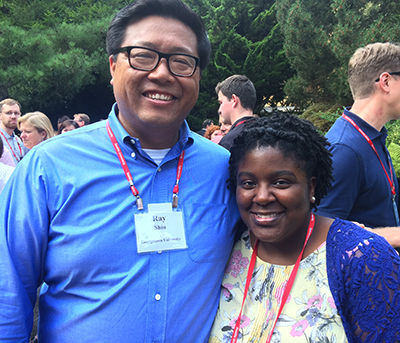 Ray Shiu and Whitney Maddox stand together outside during the Jesuit Justice in Higher Education Conference 
