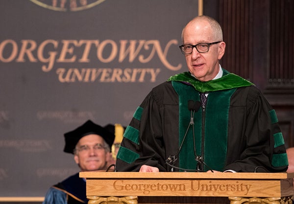 Dr. David Skorton speaks in academic regalia during the Fall Faculty Convocation