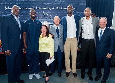 From left, Patrick Ewing (C'85), Jeff Green (C'12), Rhonda Falk, David Falk, Roy Hibbert (C'08), Otto Porter Jr., and Georgetown President John J. DeGioia.