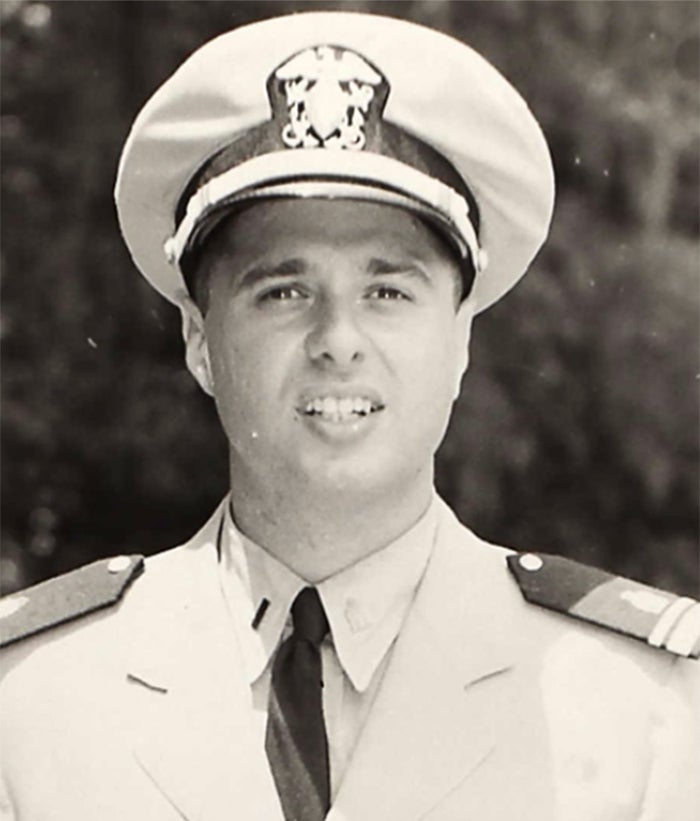 Rabbi Harold White stands for a picture in his naval uniform.