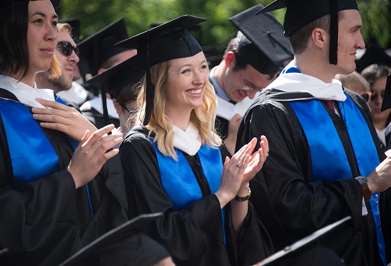 Graduate School of Arts and Sciences Class of 2016 clap as speaker delivers address