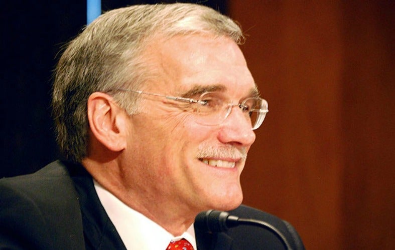 Provost Robert M. Groves smiles in a closeup photo.