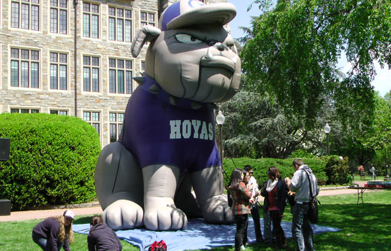 Students congregate and talk near a giant blow up version of Jack the Bulldog