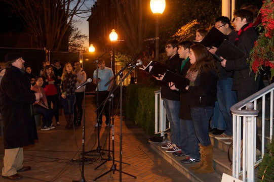 The Georgetown University Choir sings for the crowd on the McCourt steps.