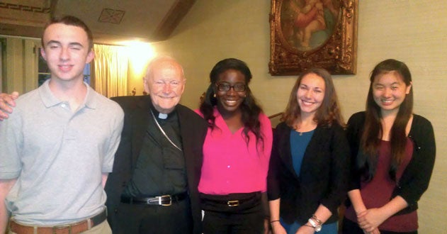 Students stand with Archbishop Emeritus of Washington Theodore Cardinal McCarrick